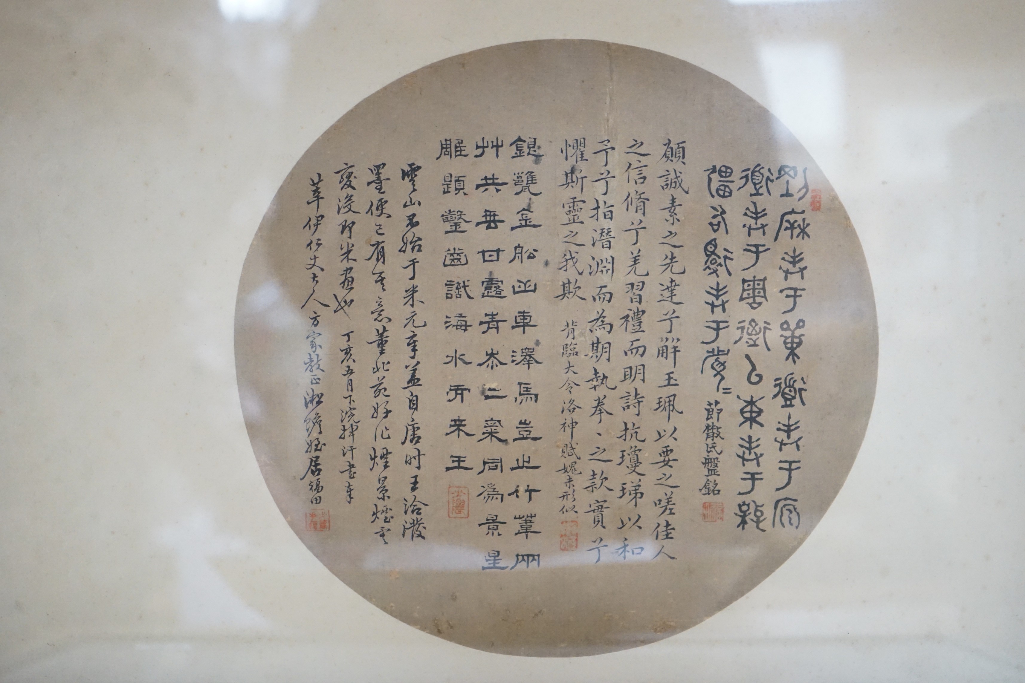 Two 19th century Chinese inscribed fan leaves, 24.5cms diameter